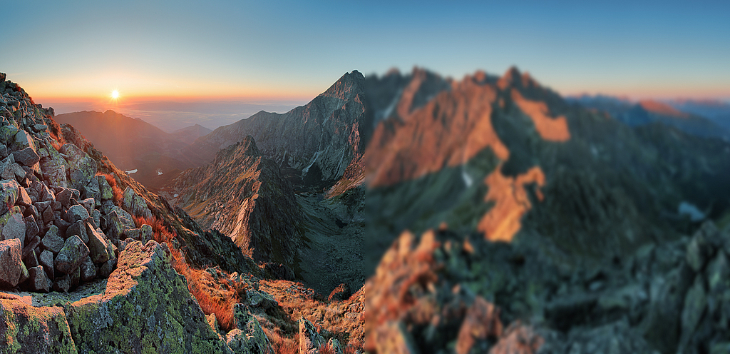 ein Sonnenuntergang über einer Berglandschaft, die linke Seite des Bildes ist scharf, die rechte Seite ist unscharf